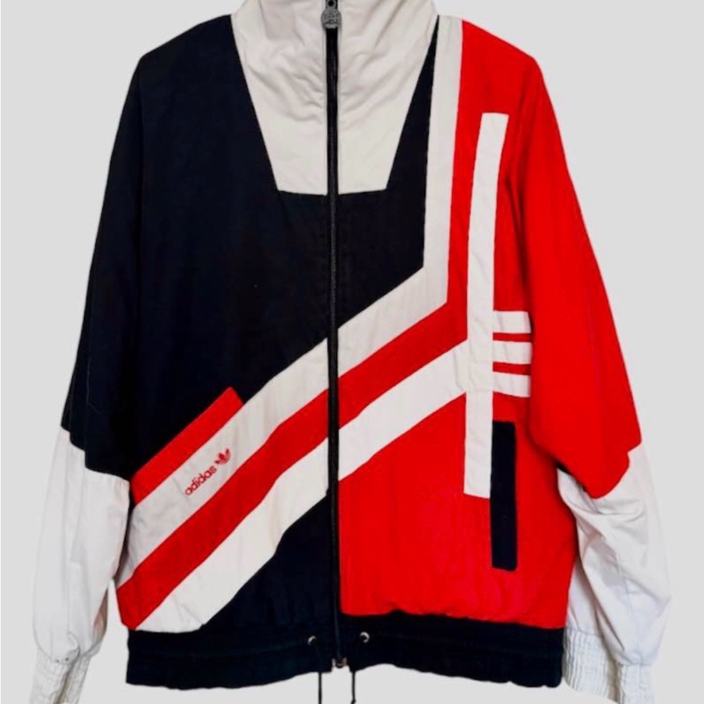 Vintage Adidas Zip Up Jacket
No size tag but it fits like a adult L
